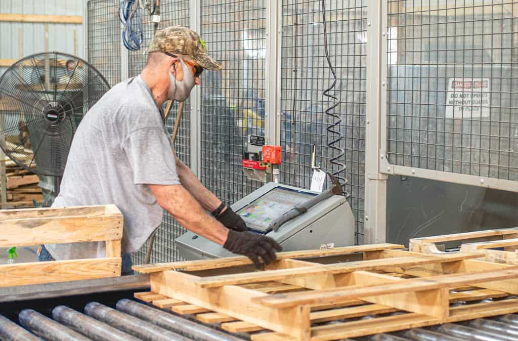 Tear down 100 pallets an hour with the Robotic Pallet Dismantler.